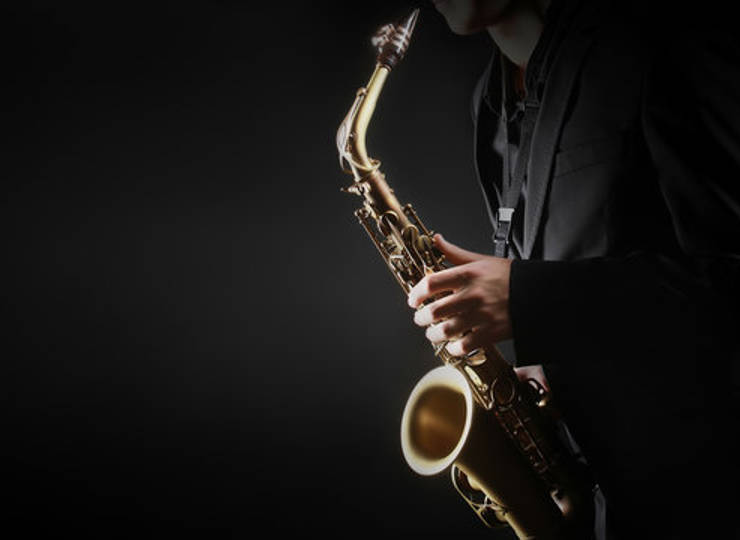 The Women's Candlelit Dining Experience with Live Sax. Tunes